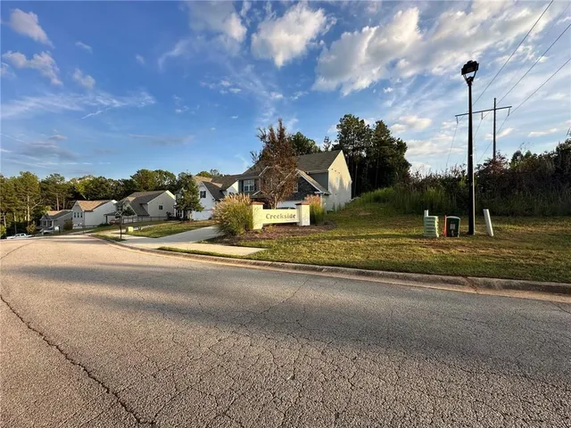 a bathroom with a bathtub and a sink