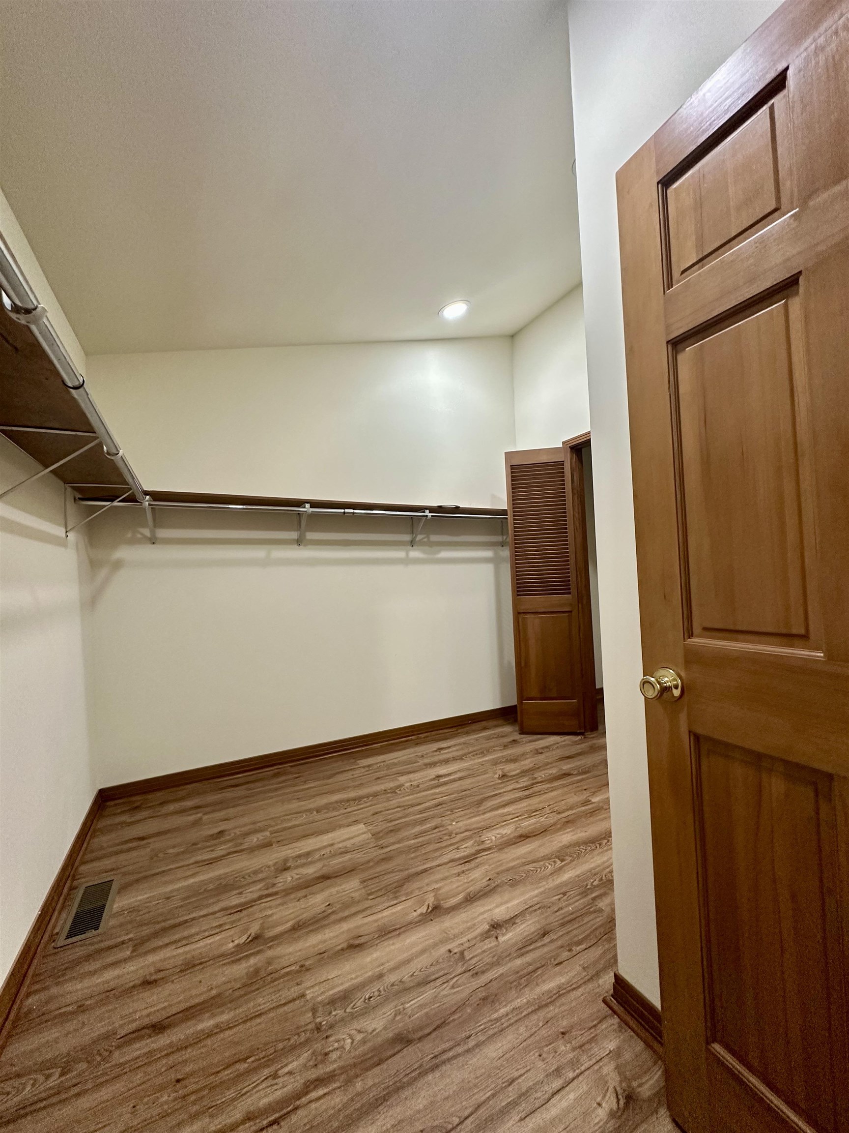 808 West Main Street Adamsville, TN 38310 - Photo 27 of 37 Spacious closet with wood finished floors