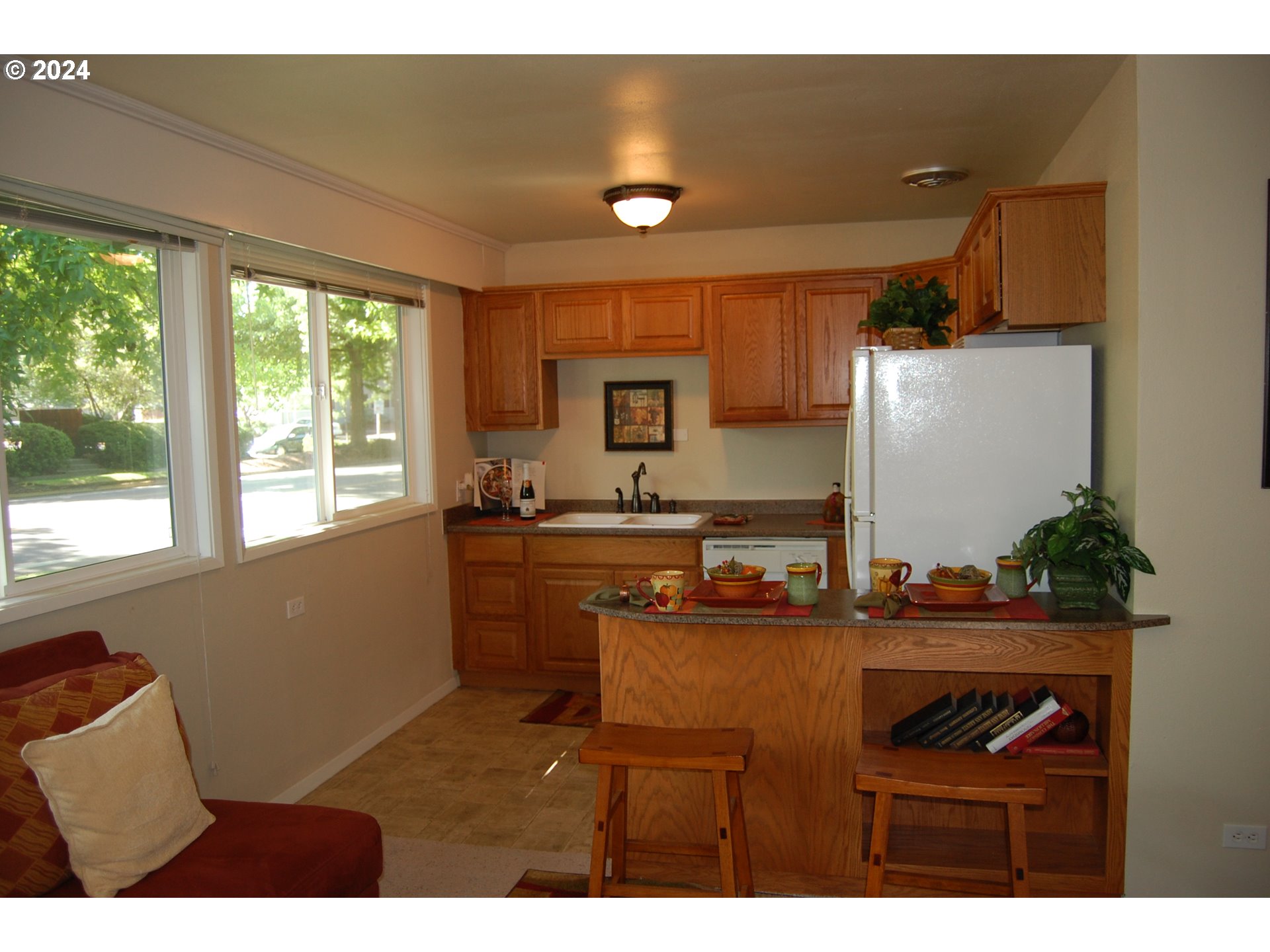 1645 Arthur Street Eugene, OR 97402 - Photo 3 of 5 a kitchen that has a sink and a stove