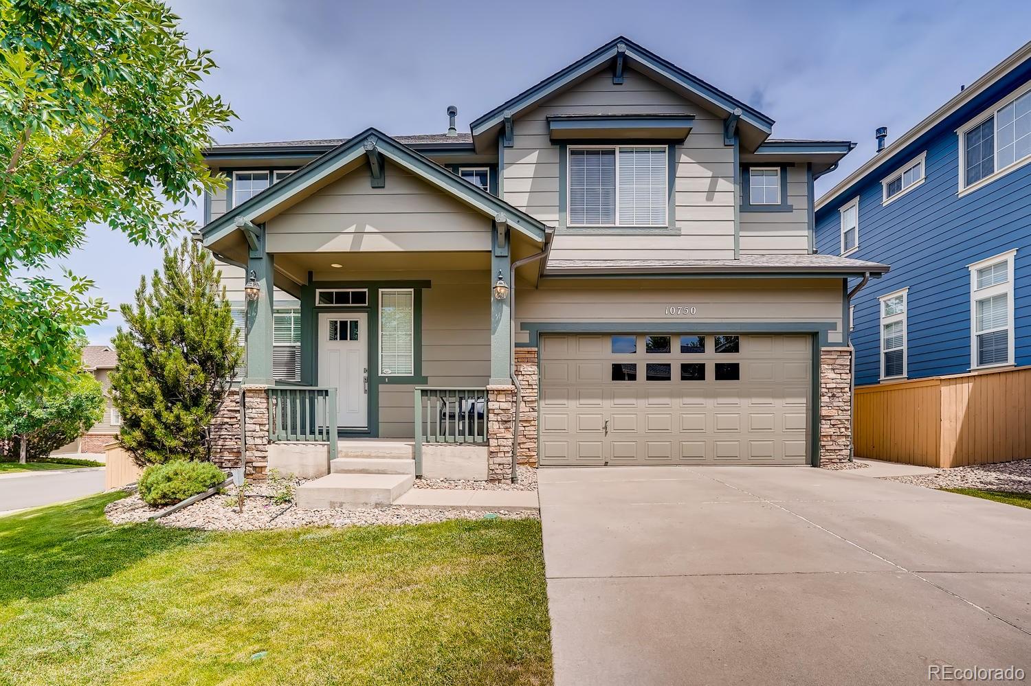 10750 Riverbrook Circle Highlands Ranch, CO 80126 - Photo 2 of 28 a view of house with outdoor space and swimming pool