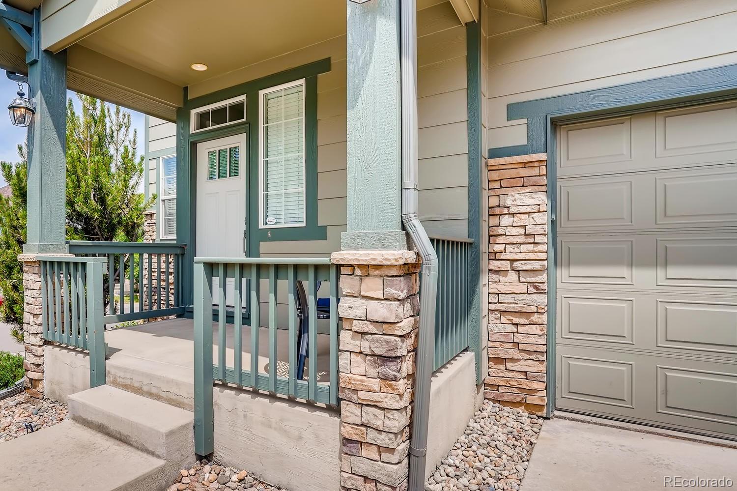 10750 Riverbrook Circle Highlands Ranch, CO 80126 - Photo 3 of 28 a balcony view with a glass door