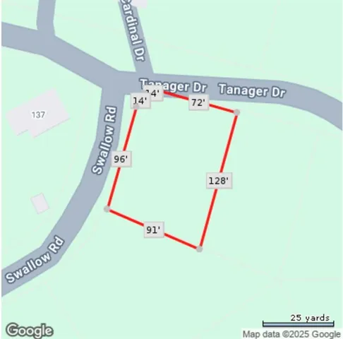 a utility room with furniture and a wooden floor