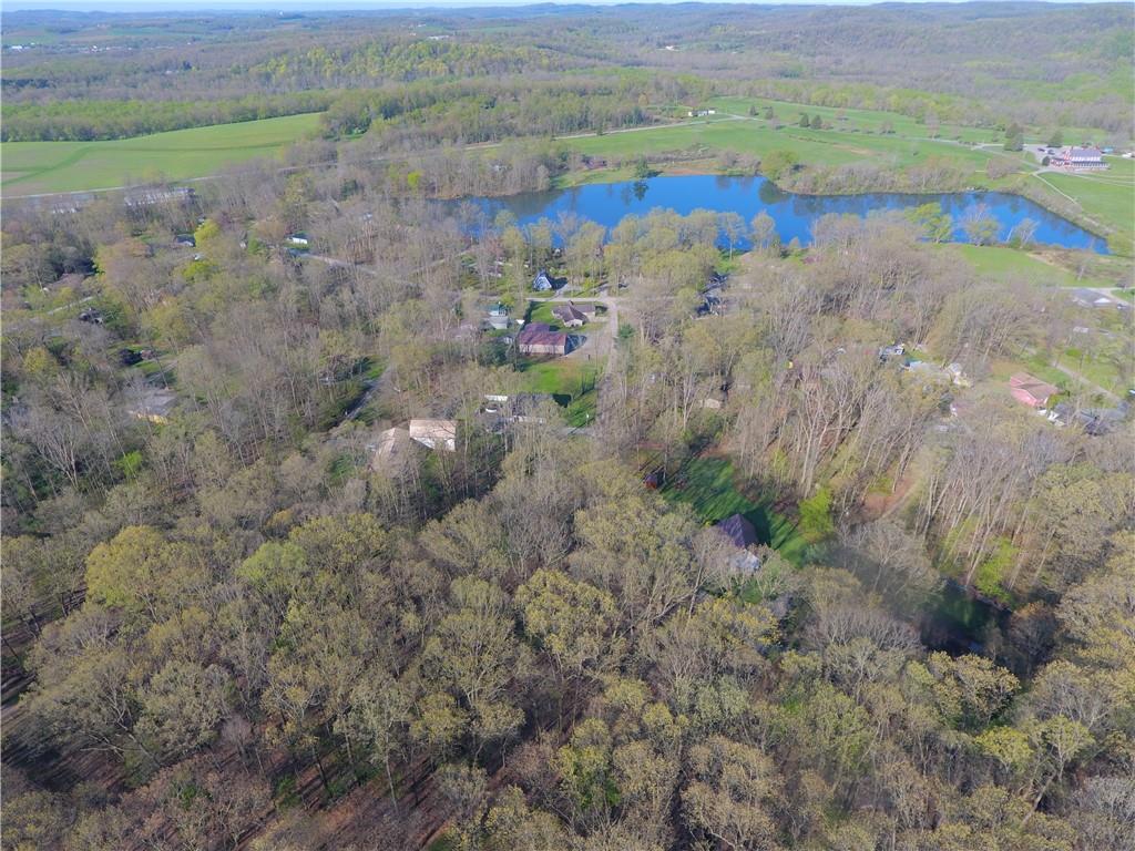 0 Swallow Road New Alexandria, PA 15670 - Photo 6 of 14 a view of a lake with a mountain and a yard