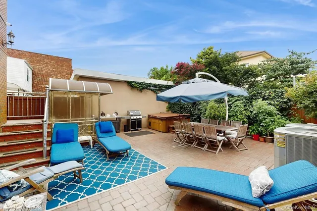 a backyard of a house with seating space