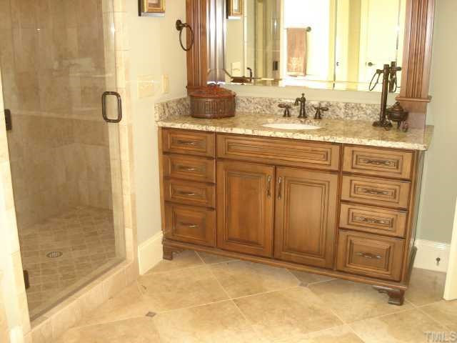 9032 Chelsea Drive, Unit LOT 6 Raleigh, NC 27603 - Photo 8 of 12 Oversized floor tiles, split granite vanities, large walk-in shower just to name a few things you'll love in this master bath Master Bath/Spa