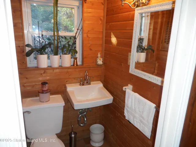 a kitchen with sink cabinets and window