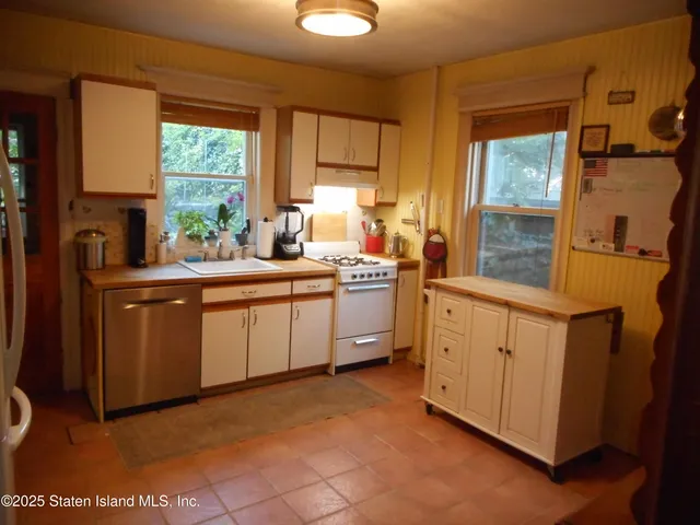 a bed room with a bed and furniture