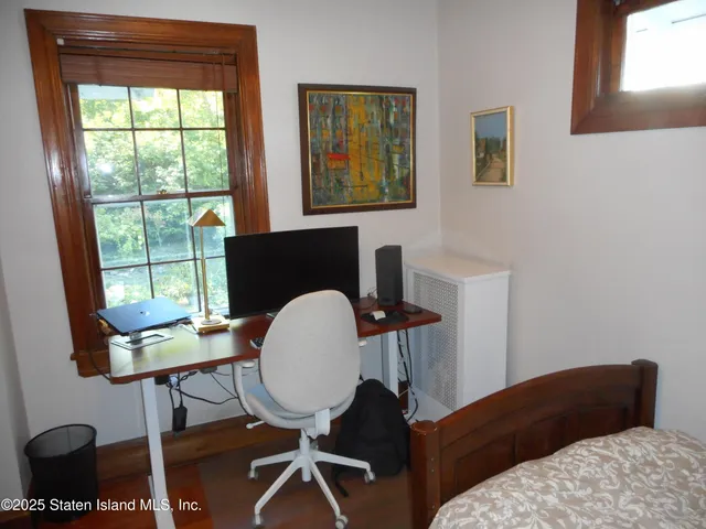 a room with furniture and a window