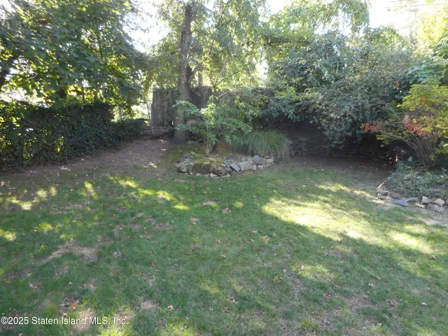 a view of a lake with a yard