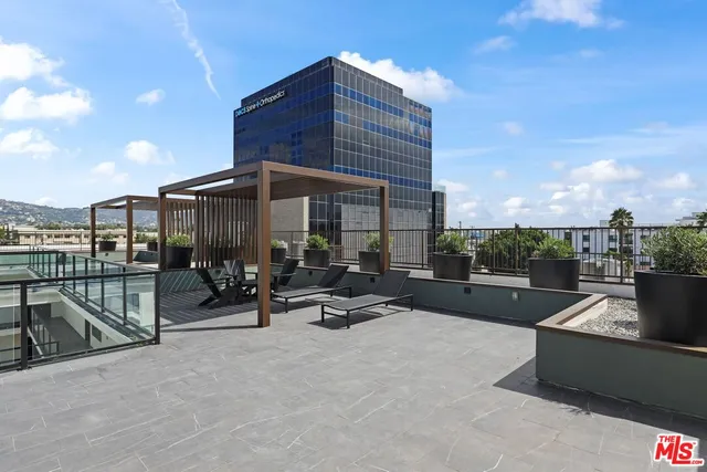 a view of a terrace with sitting area