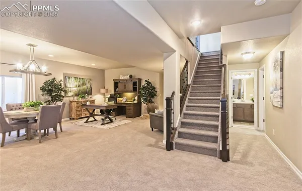 a very nice looking room with lots of furniture and lots of furniture
