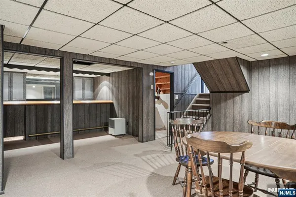 a dinning room with furniture and a table