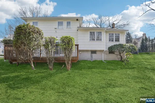 a house view with a garden space