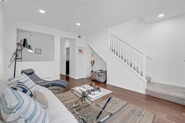 a room with furniture and wooden floor