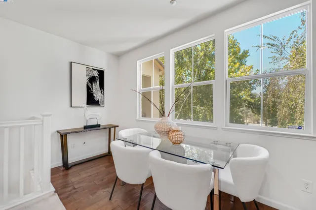 a kitchen with stainless steel appliances granite countertop a stove a refrigerator and a sink