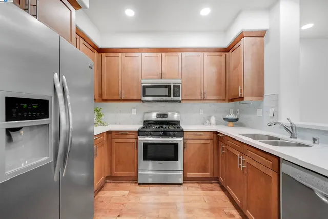 a living room with furniture and a mirror
