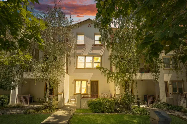 a sign that is on a brick wall