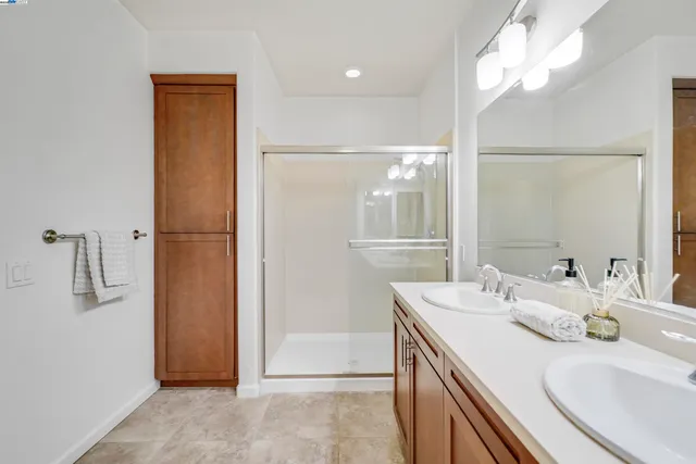 a bedroom with a bed furniture and a window