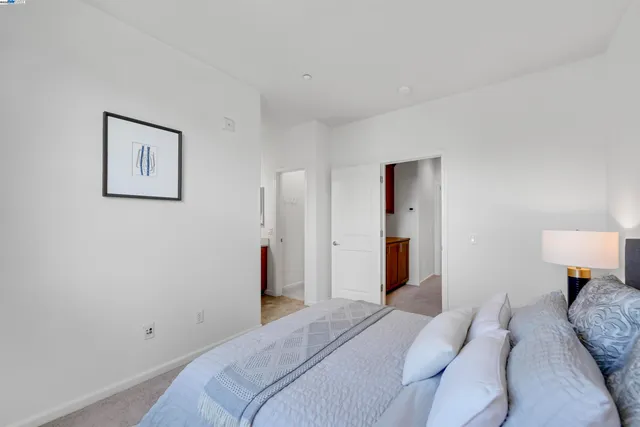 a view of a brick building next to a yard