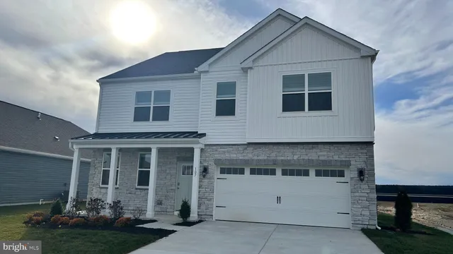 a front view of a house with a porch