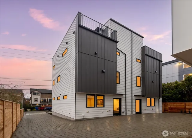 a view of a street with cars