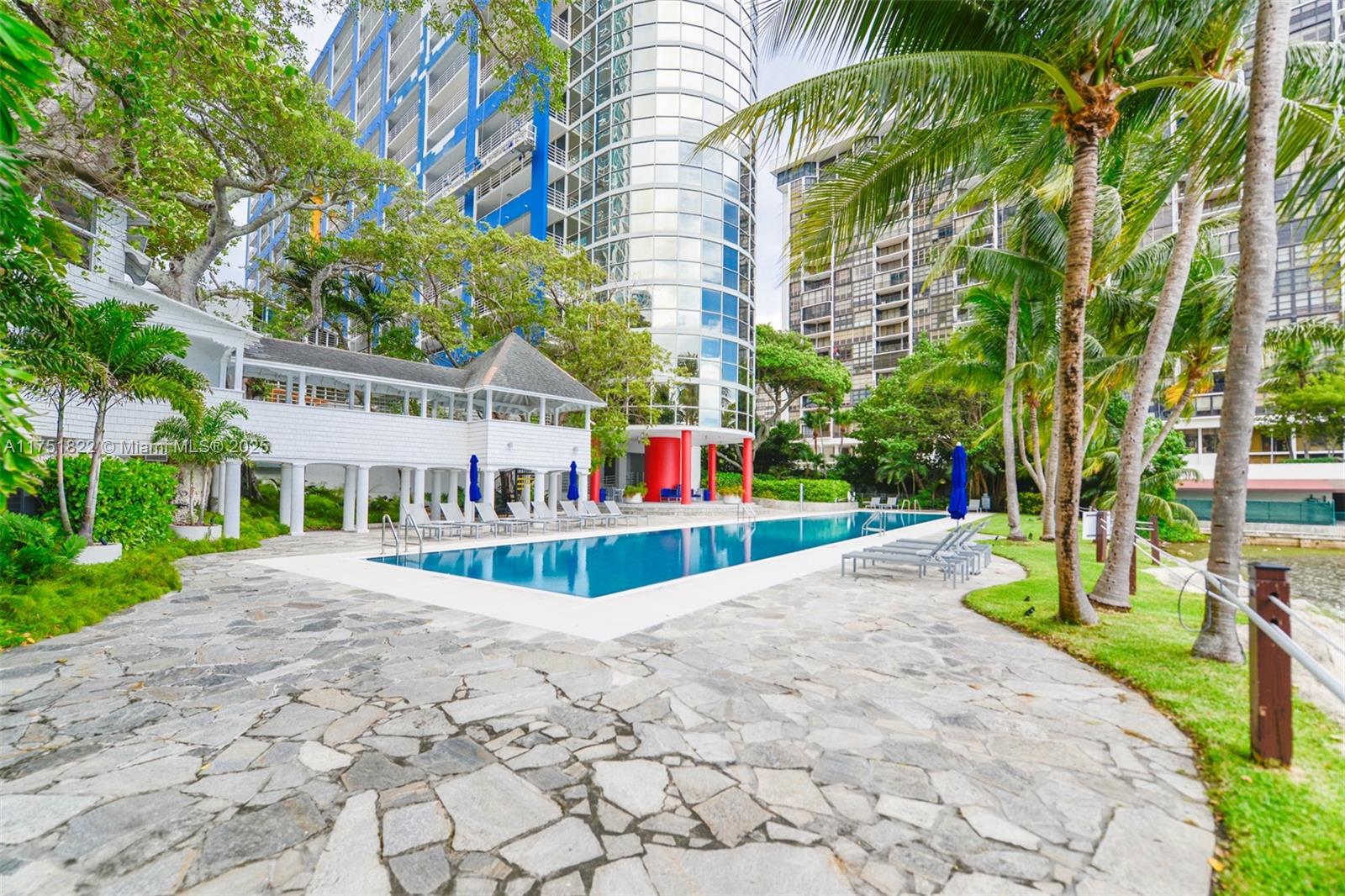 2025 Brickell Avenue, Unit 901 Miami, FL 33129 - Photo 35 of 49 a view of a house with swimming pool and sitting area
