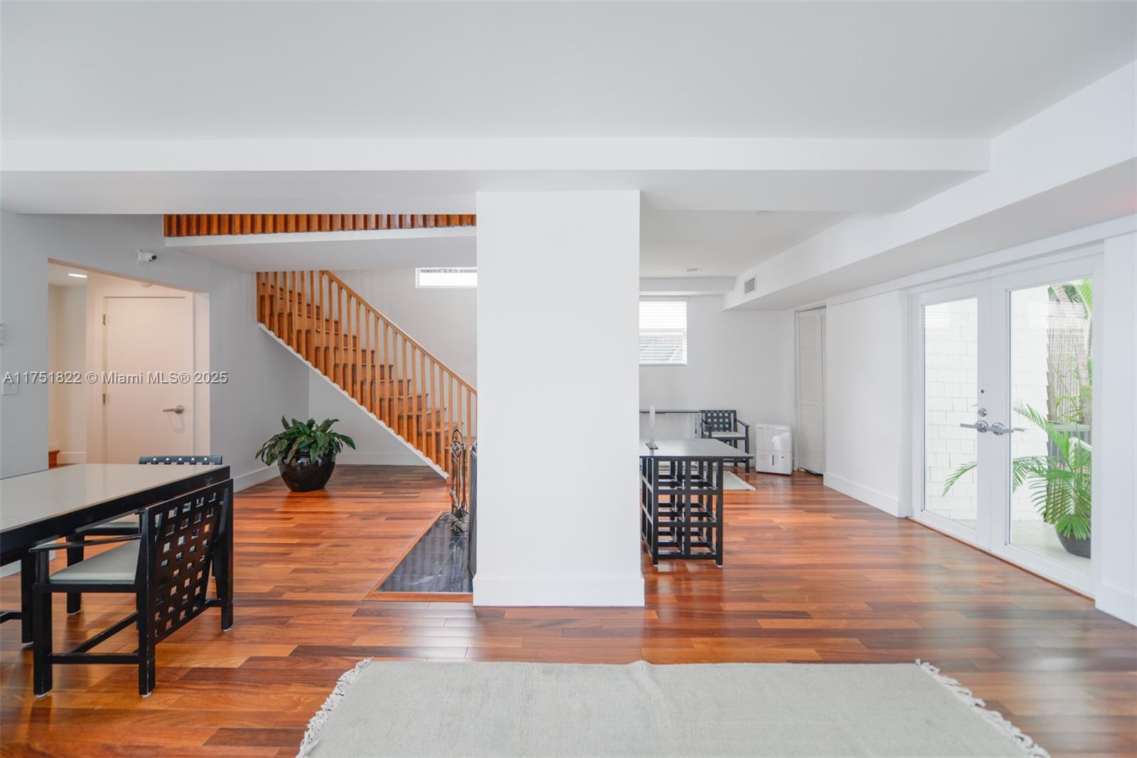2025 Brickell Avenue, Unit 901 Miami, FL 33129 - Photo 38 of 49 a view of kitchen with furniture and wooden floor