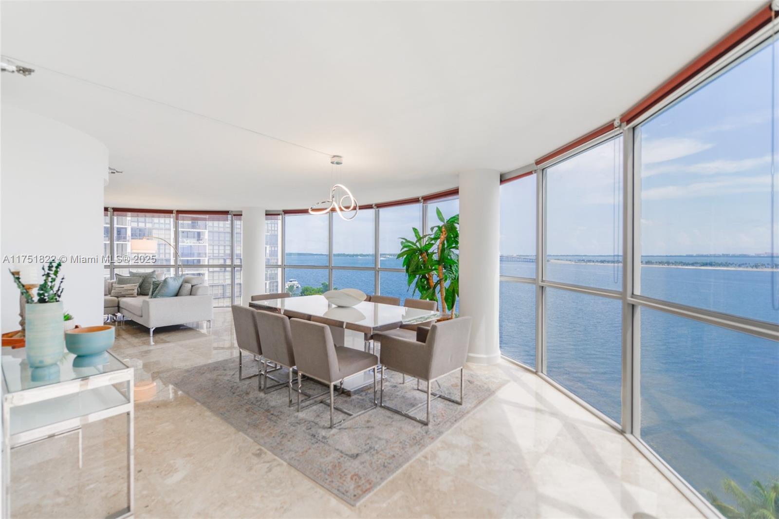 2025 Brickell Avenue, Unit 901 Miami, FL 33129 - Photo 7 of 49 a view of a dining room with furniture window and outside view