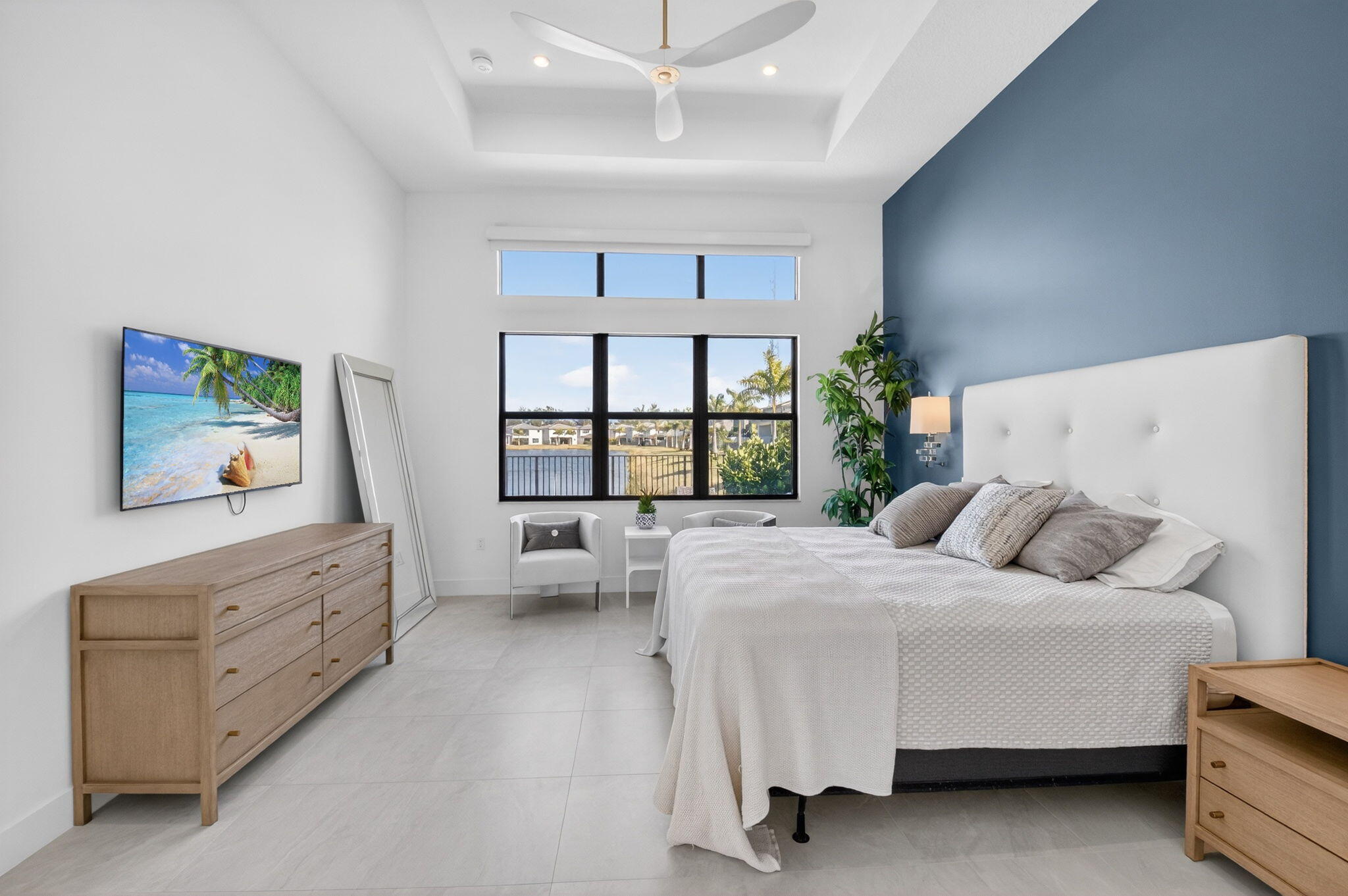 20370 Whistling Straits Way Boca Raton, FL 33434 - Photo 13 of 40 a bedroom with a large bed and a window