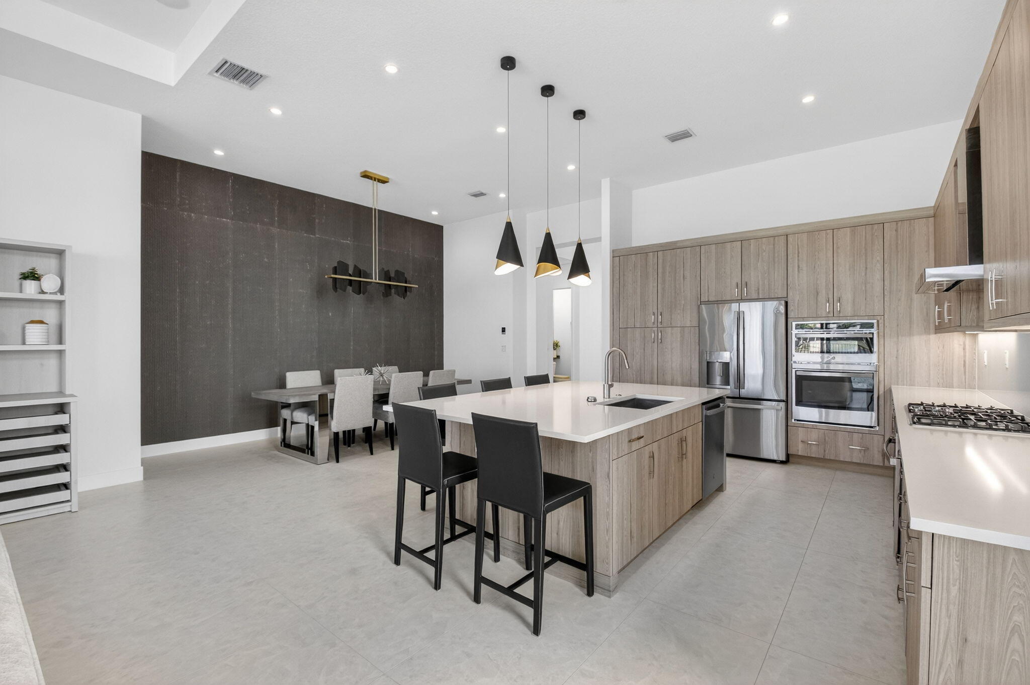 20370 Whistling Straits Way Boca Raton, FL 33434 - Photo 6 of 40 a kitchen with sink cabinets and stainless steel appliances
