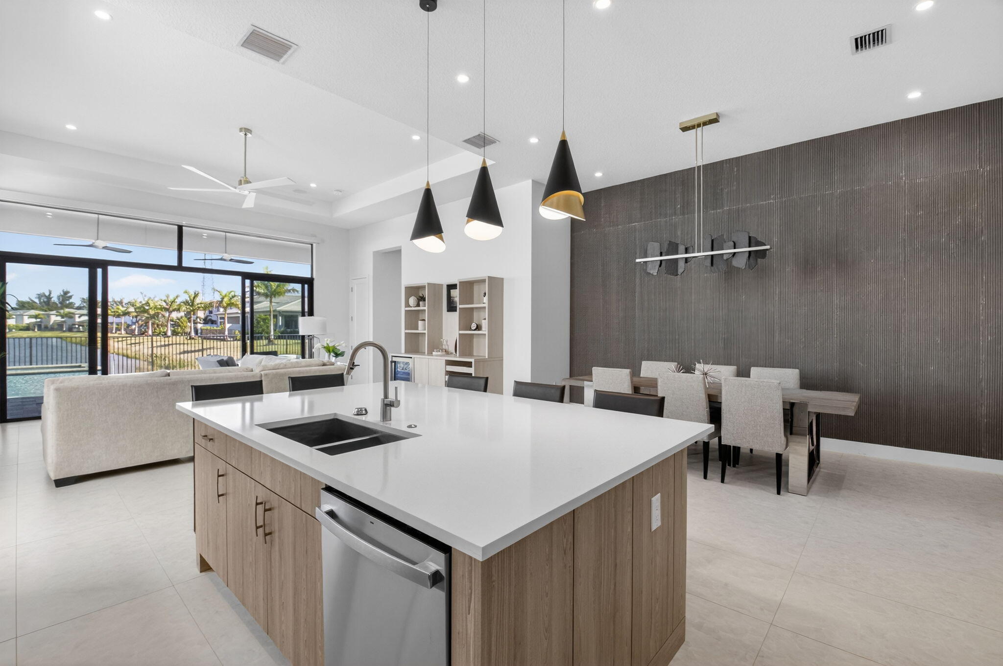 20370 Whistling Straits Way Boca Raton, FL 33434 - Photo 8 of 40 a kitchen with stainless steel appliances granite countertop a sink a stove and a refrigerator