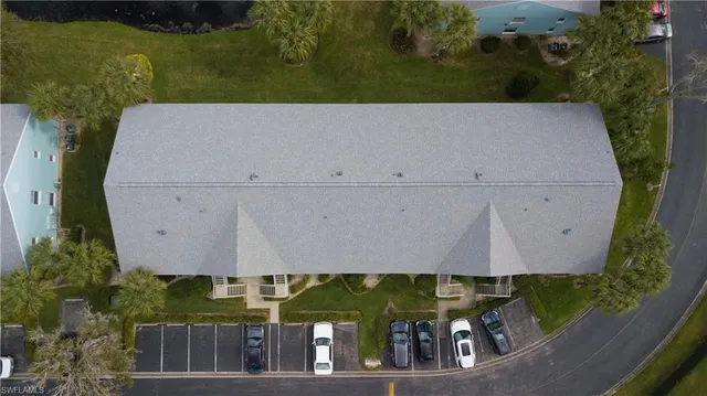 an aerial view of a house with a garden