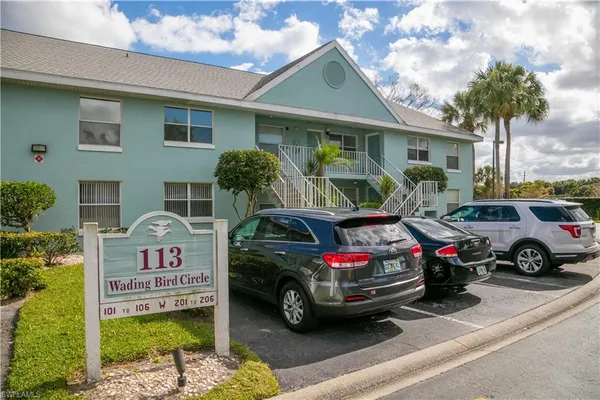 a car parked in front of a house