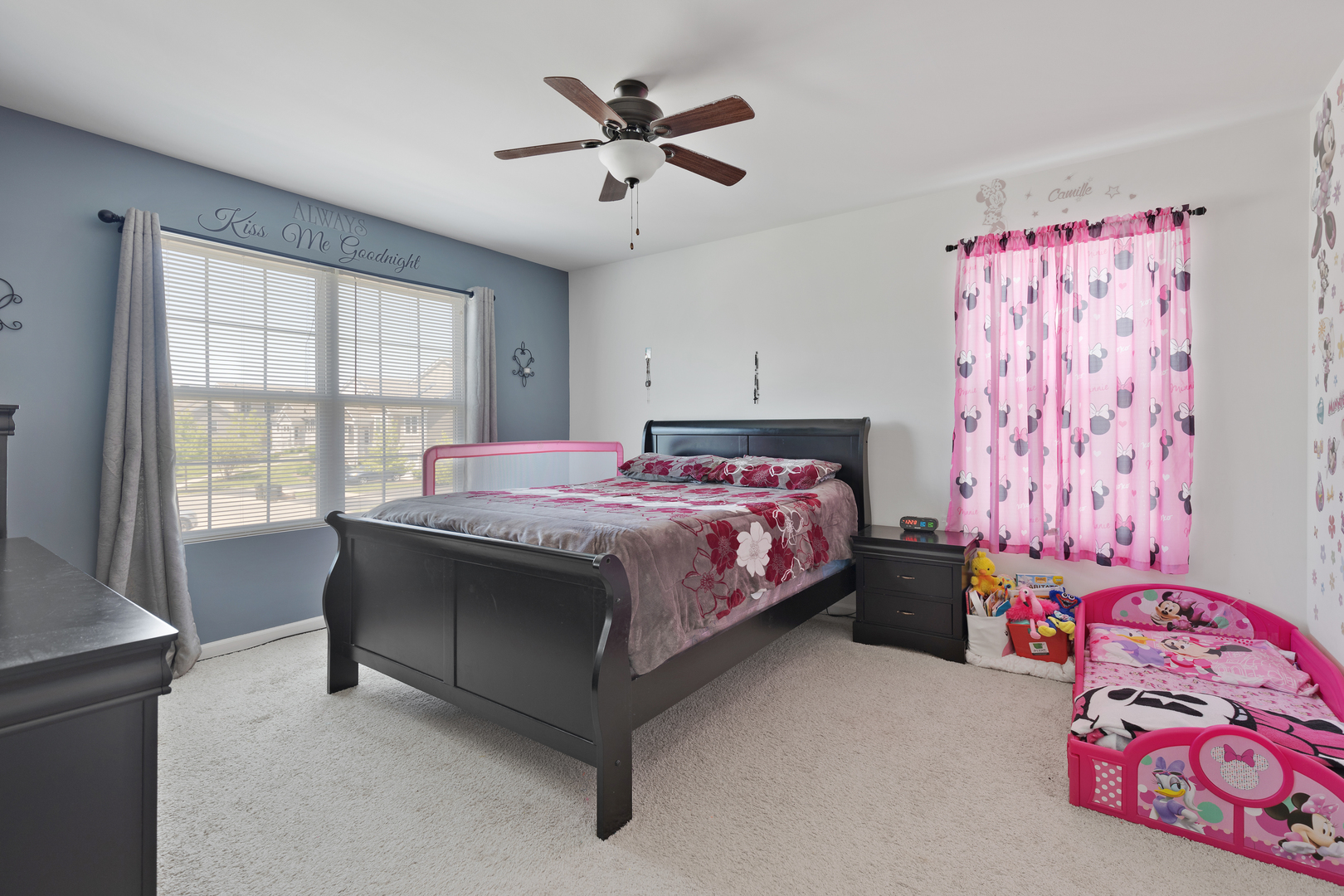 1651 Ruby Drive Pingree Grove, IL 60140 - Photo 15 of 26 a bedroom with a bed and a chandelier