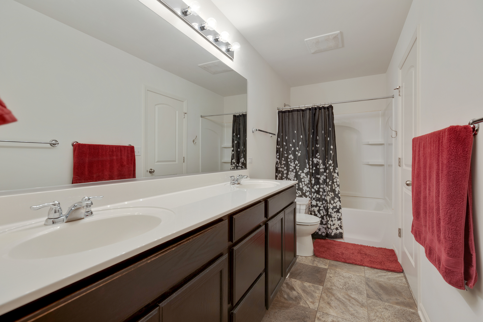 1651 Ruby Drive Pingree Grove, IL 60140 - Photo 17 of 26 a bathroom with a sink a toilet and shower
