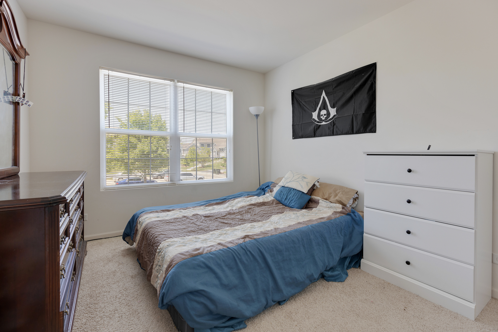 1651 Ruby Drive Pingree Grove, IL 60140 - Photo 18 of 26 a bedroom with a bed and a window