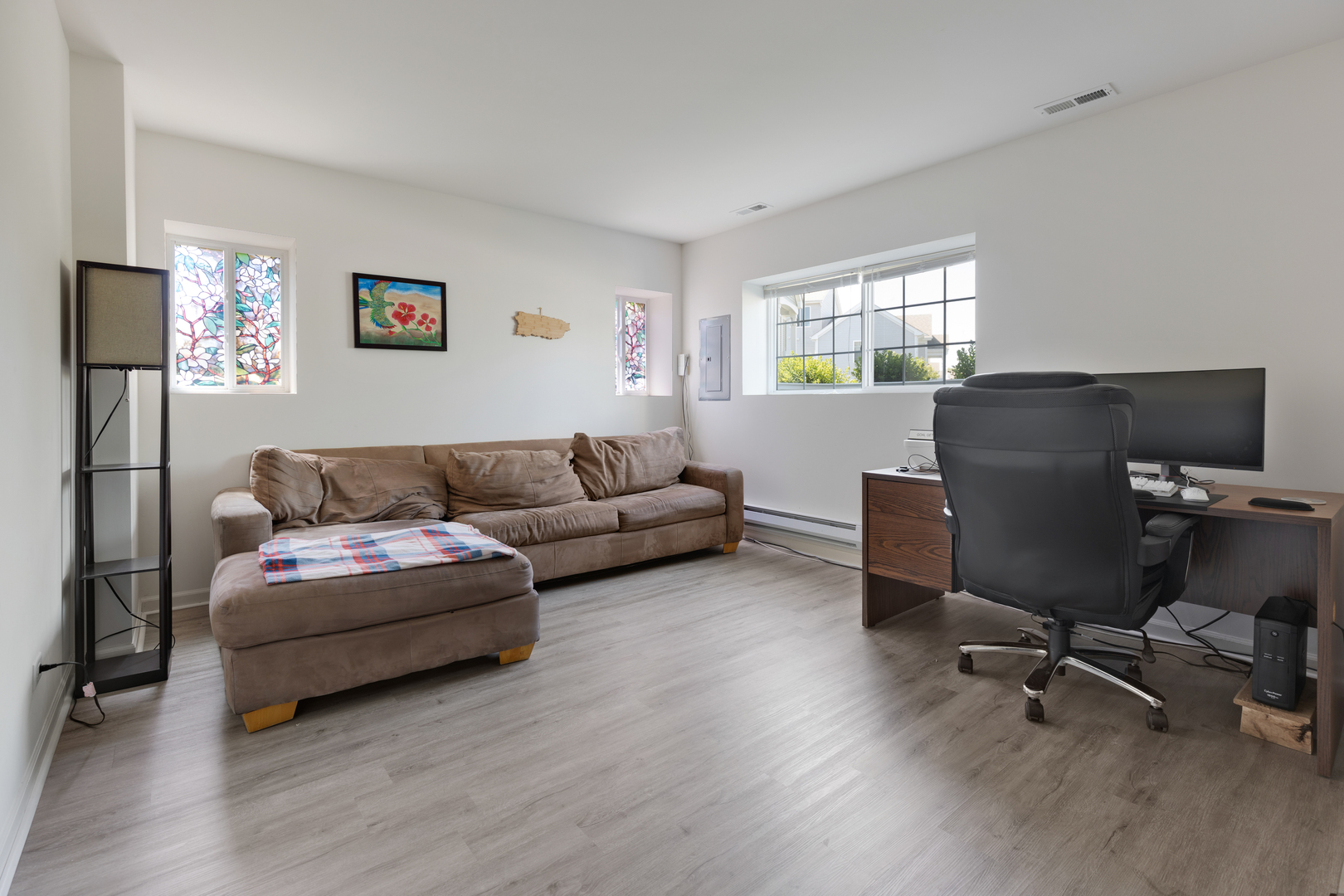 1651 Ruby Drive Pingree Grove, IL 60140 - Photo 19 of 26 a livingroom with workspace and a couch