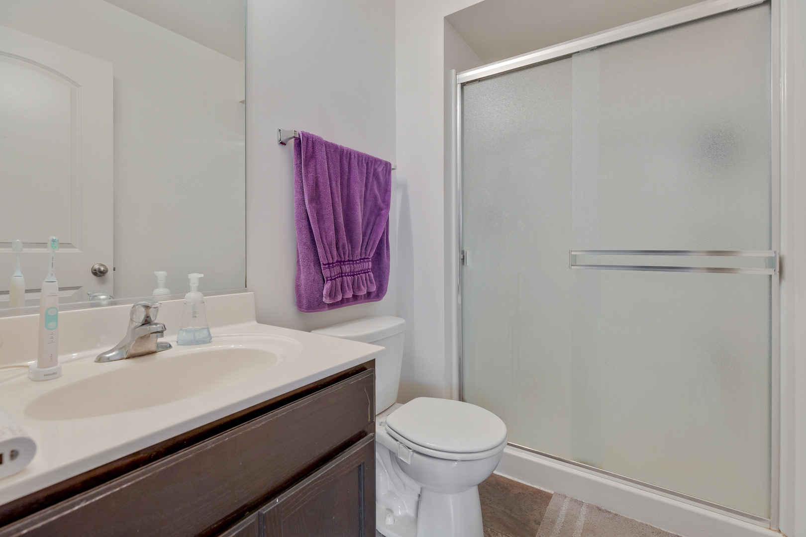 1651 Ruby Drive Pingree Grove, IL 60140 - Photo 22 of 26 a bathroom with a sink mirror vanity and toilet