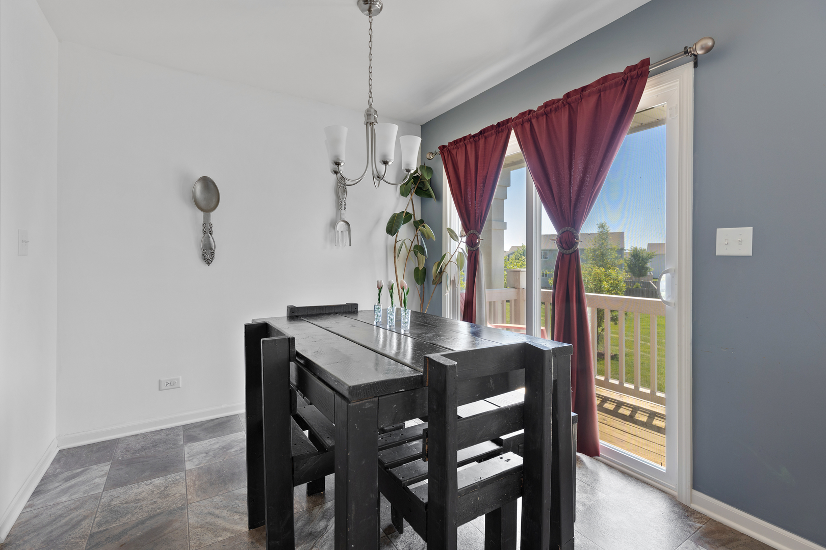 1651 Ruby Drive Pingree Grove, IL 60140 - Photo 7 of 26 a view of a dining room with furniture window and outside view