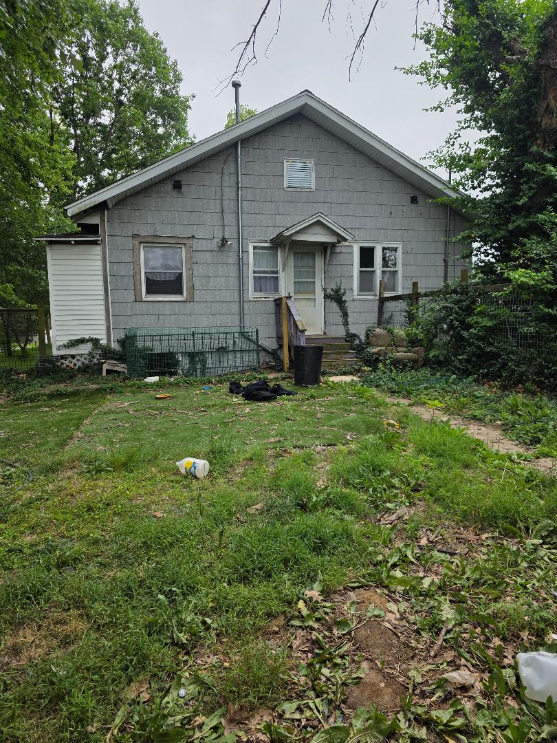 801 Maple Street Zeigler, IL 62999 - Photo 2 of 3 a front view of a house with yard and trees