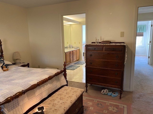107 Center Depot Road, Unit C Charlton, MA 01507 - Photo 11 of 39 a bedroom with a bed and a dresser