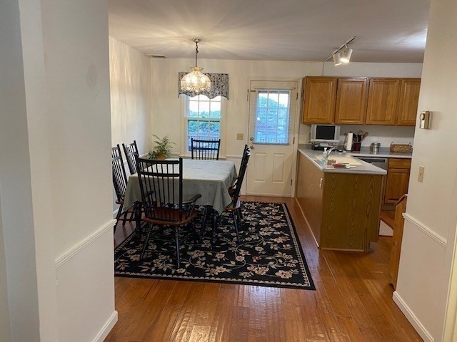 107 Center Depot Road, Unit C Charlton, MA 01507 - Photo 27 of 39 a view of a dining room with furniture window and wooden floor