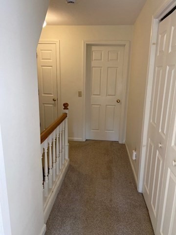 107 Center Depot Road, Unit C Charlton, MA 01507 - Photo 31 of 39 a view of a hallway