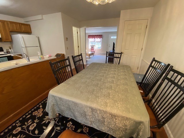 107 Center Depot Road, Unit C Charlton, MA 01507 - Photo 7 of 39 a bed sitting in a room next to a window