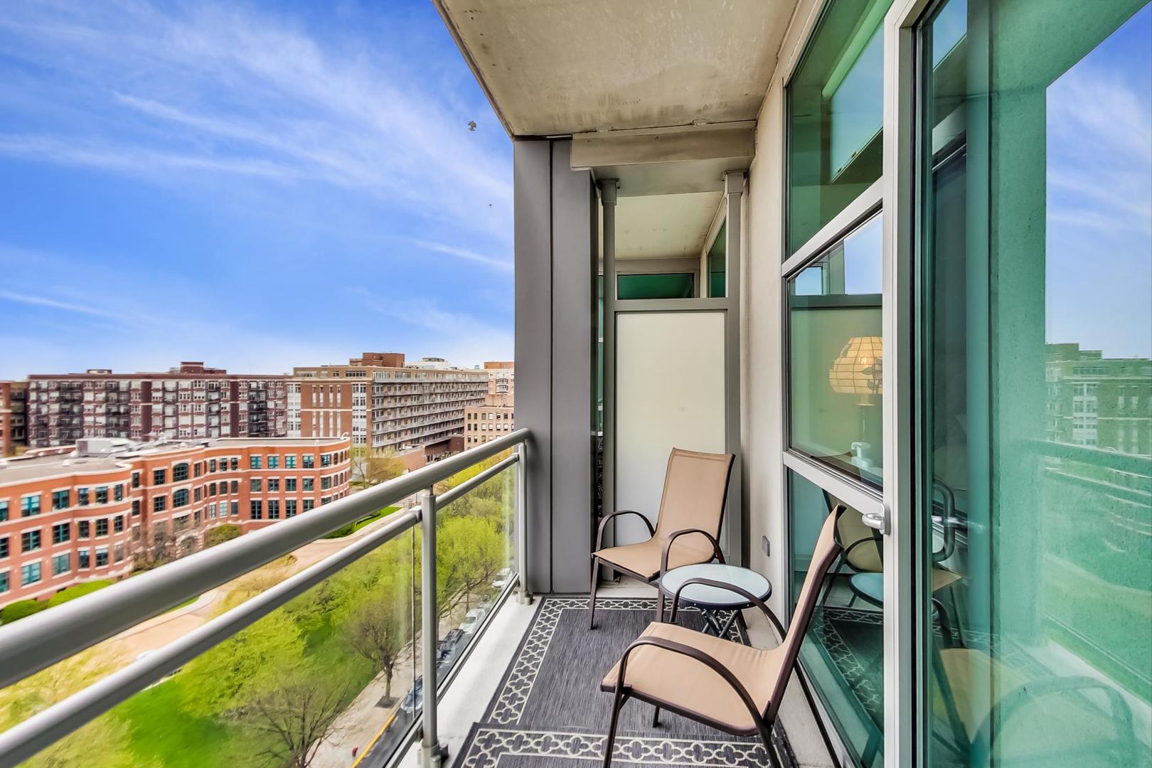 225 South Sangamon Street, Unit 809 Chicago, IL 60607 - Photo 24 of 34 a view of a balcony with chairs