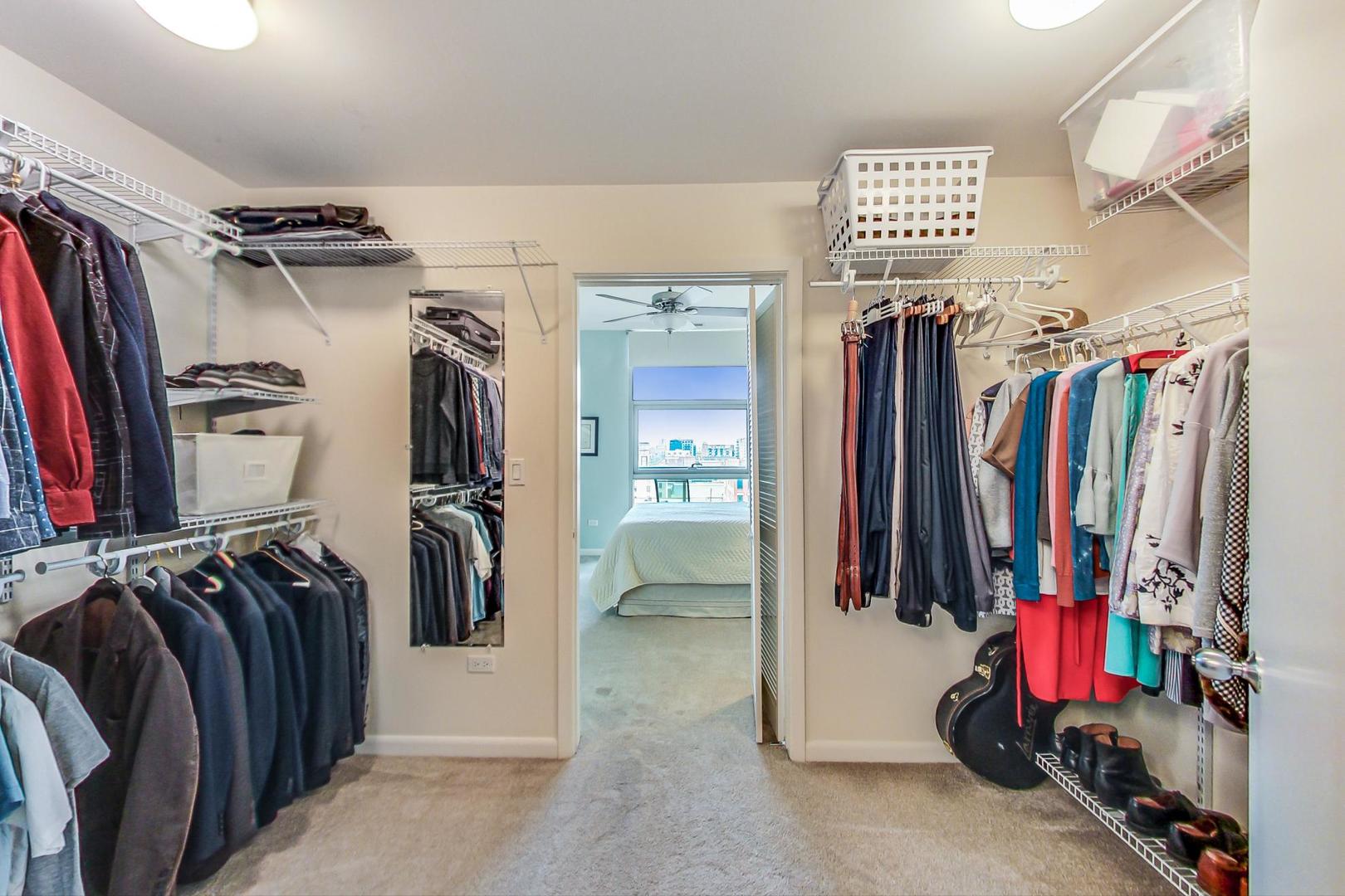 225 South Sangamon Street, Unit 809 Chicago, IL 60607 - Photo 29 of 34 a view of walk in closet with clothes