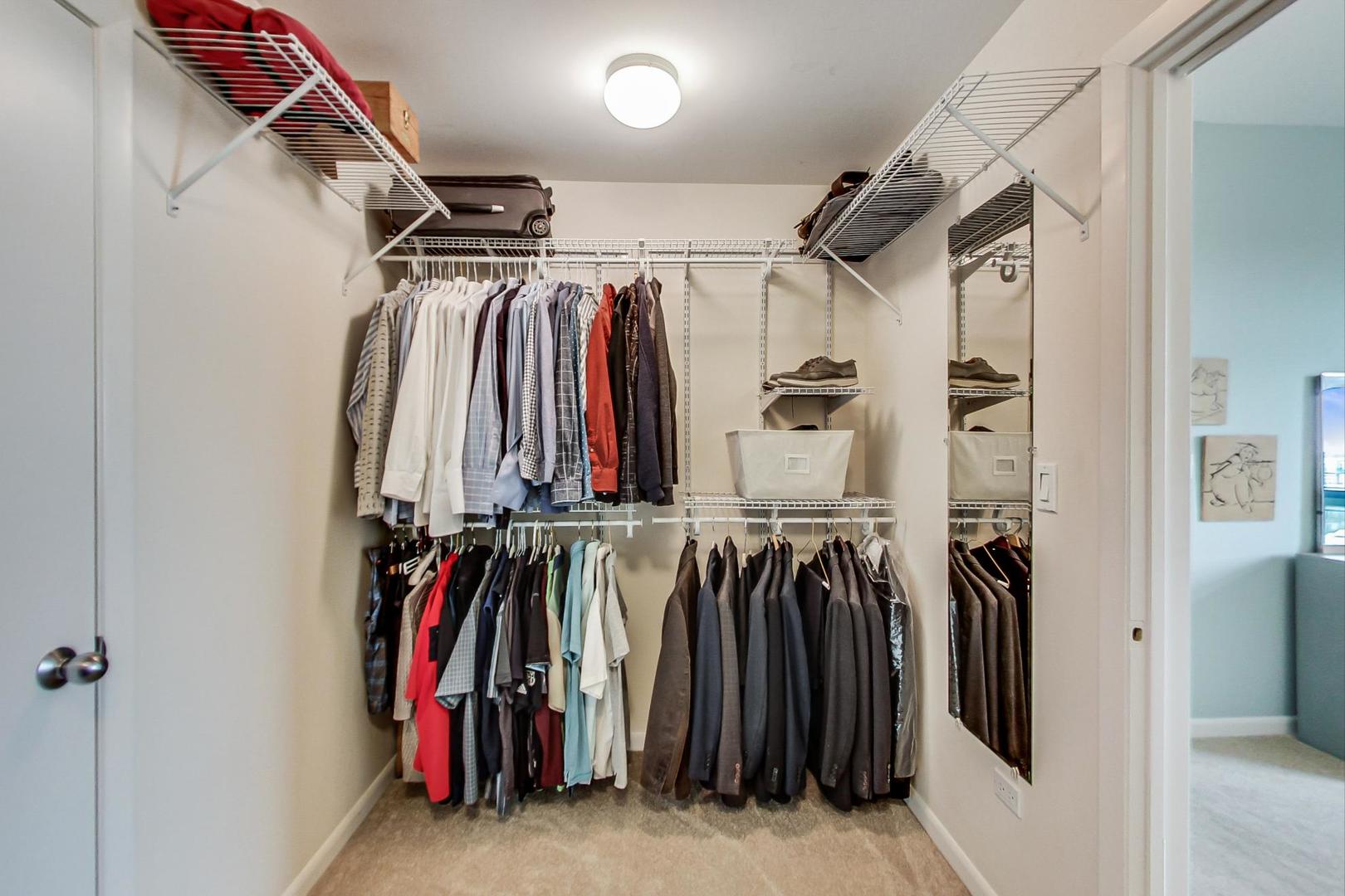225 South Sangamon Street, Unit 809 Chicago, IL 60607 - Photo 30 of 34 a view of walk in closet with clothes