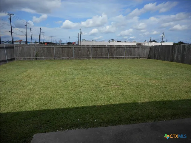a view of a swimming pool with a lake