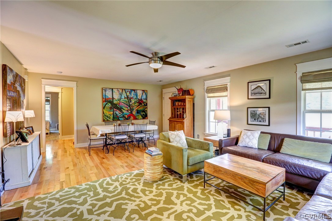 5226 North Warriner Road Richmond, VA 23231 - Photo 12 of 50 a living room with furniture and wooden floor