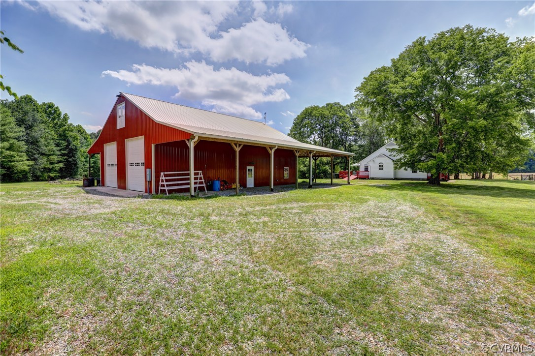 5226 North Warriner Road Richmond, VA 23231 - Photo 2 of 50 a view of a house with a yard and sitting area